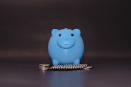 There is money coins to stack of coins. Close up of coins to stack of coins and piggy bank,Money, Financial, Business Growth conceptの写真素材