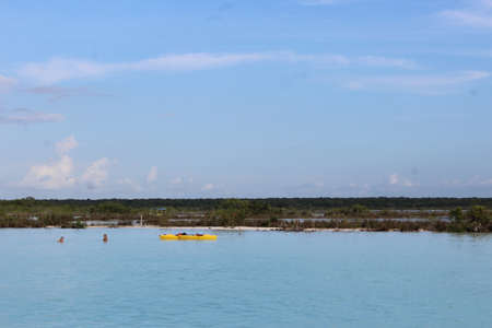 Boat on the beautiful lagoon of seven color - Bacalarの写真素材
