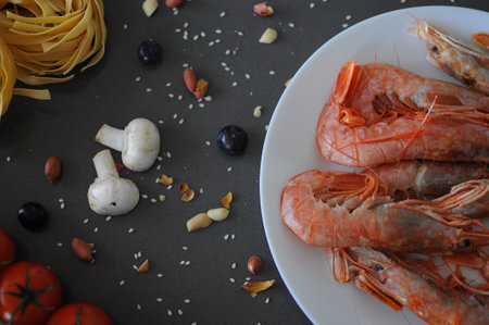 shrimp spicy prawn seafood meal vegetarian food pescetarian diet Asian Cooking snack copy space food background rustic. top view . High quality photoの写真素材