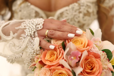Bright Beautiful bridal bouquet with roses and ribbon. High quality photoの写真素材