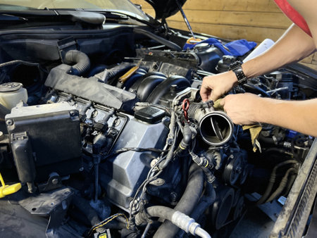 Auto mechanic working in garage. Repair service. High quality photoの写真素材