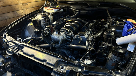 Auto mechanic working in garage. Repair service. High quality photoの写真素材