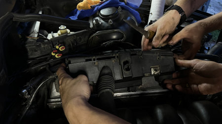 Auto mechanic working in garage. Repair service. High quality photoの写真素材