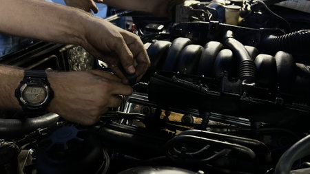 Auto mechanic working in garage. Repair service. High quality photoの写真素材