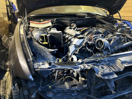 Auto mechanic working in garage. Repair service. High quality photoの写真素材