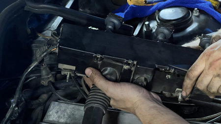 Auto mechanic working in garage. Repair service. High quality photoの写真素材