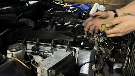 Auto mechanic working in garage. Repair service. High quality photoの写真素材