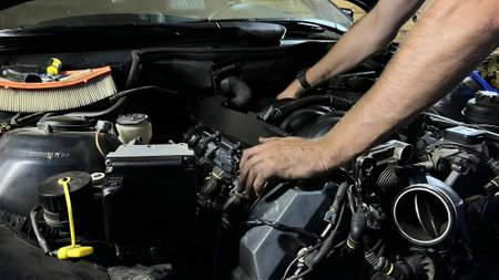 Auto mechanic working in garage. Repair service. High quality photoの写真素材