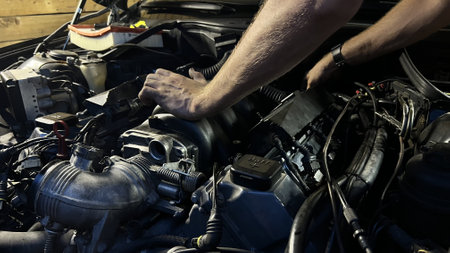 Auto mechanic working in garage. Repair service. High quality photoの写真素材