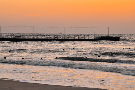 Sunset at the Imperial Beach. Cloudy sunset and pier in San Diego. . High quality photoの写真素材