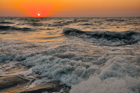 Sunset at the beach. Cloudy sunset. . High quality photoの写真素材