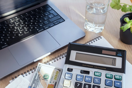 Accounting, calculating income-expenditure and analyzing real estate investment data, dedicated to the progress and growth of the company, Financial and tax systems concept. High quality photoの写真素材
