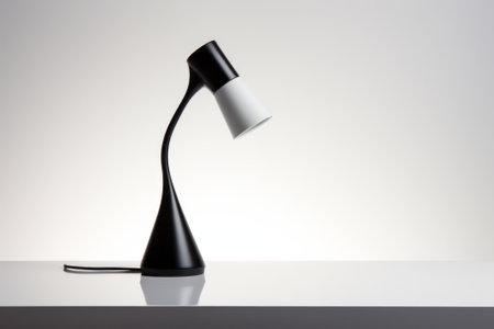 Black lamp, minimalistic style product on white background.の素材