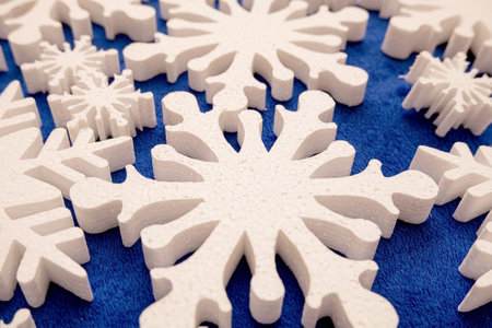 a lot of white foam snowflakes, New Year's decor for home, office, shopの写真素材
