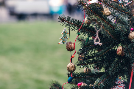Handmade decoration on a Christmas tree. Diy ideas. Environment concept with copy space