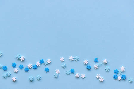 Plastic blue and white snowflake winter backgroundの写真素材