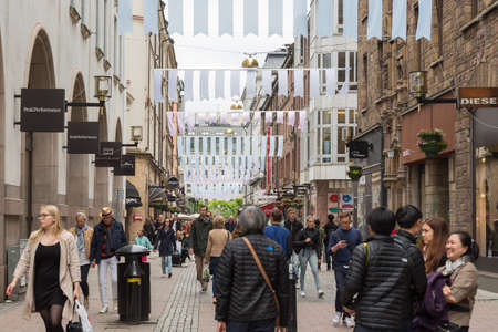 City center. Local and tourist pedestrian in shopping district. Stockholm, Sweden - MAY 28, 2016