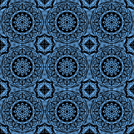 Seamless beautiful black pattern on a blue background.の写真素材