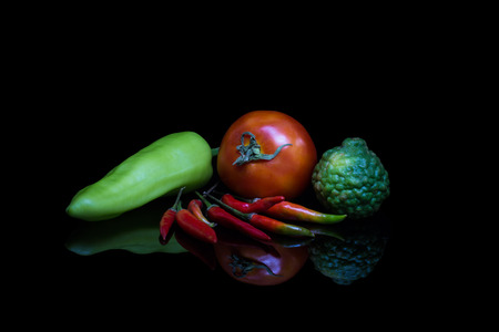Ingredients for cooking on black background with reflectの写真素材