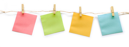 collection of colorful post it paper note with hemp rope on white backgroundの写真素材