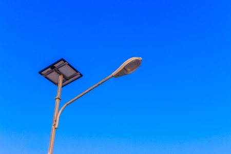 Street lamp powered by solar batteries panelの写真素材
