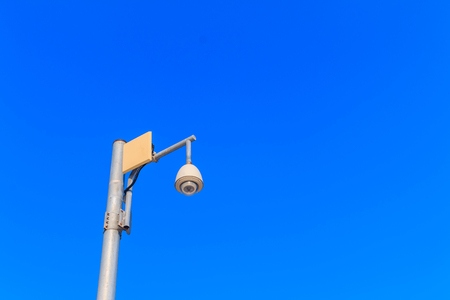 cctv with blue sky backgroundの写真素材