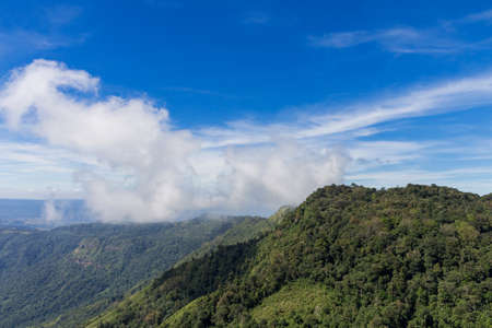 The blue sky and cloudy over the mountain in day