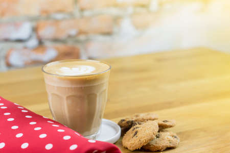 A cup of hot coffee late art in coffee shopの写真素材