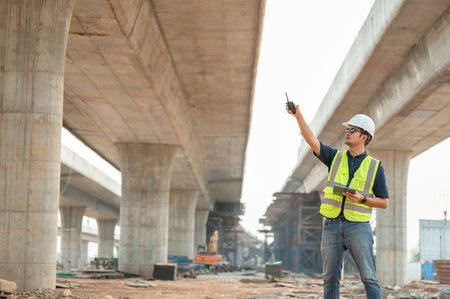 Highway engineering works on construction project planning. Engineer supervising the construction of...