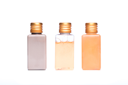 bottle and liquid isolated on white backgroundの写真素材