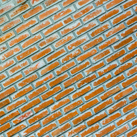 Background of old vintage brick wallの写真素材