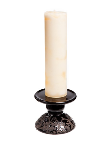 candle and candlestick isolated over a white backgroundの写真素材