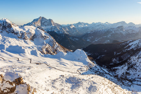 Winding road in the Dolomites in winter, Italy.の写真素材