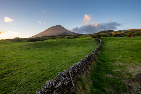 Sunset over the landscape of Pico volcano in the Azores Islandの写真素材