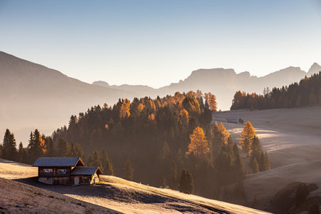 Alpine hut in the Dolomites at sunrise, Italy.の写真素材