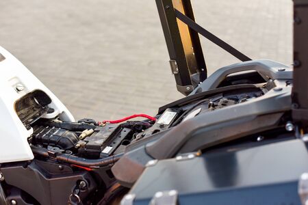 Motorcycle Car Wash Motorcycle Big Bike cleaning with foam injection Make more clean. A series of photos a biker washes his motorcycle at the car wash. Black-white-red color of the bike. Clean vehicleの写真素材