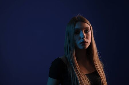Beautiful, glamorous, girl, model in a photo studio with color filters. Portrait, beauty, style....