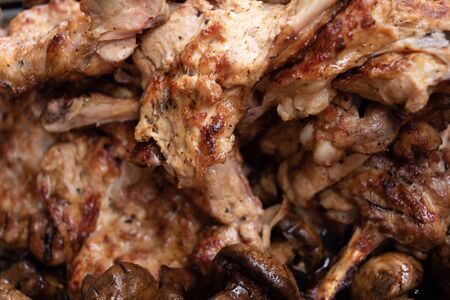 Grilled meats and vegetables, barbecue. mushrooms and grilled meat. Street food. Photo of food. Grilled pork and mushroomsの写真素材
