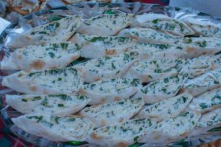 Pita bread wrapped with cottage cheese and vegetables. pita bread with cottage cheese and herbs