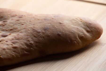 pita bread on wooden board. Pita on the board. Photo of food, pita bread cooked on kefir. Healthy...