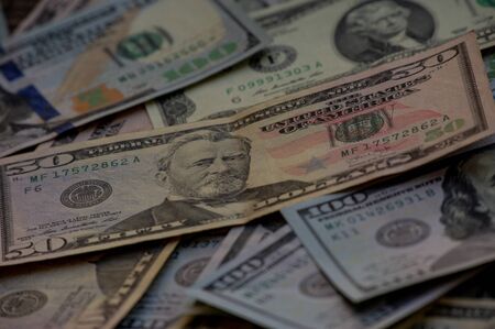 dollars background. Dollars background. Background of different us dollar banknotes. Finance...