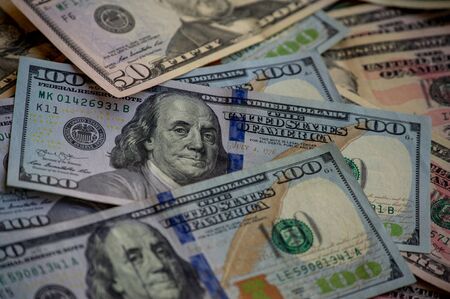 dollars background. Dollars background. Background of different us dollar banknotes. Finance...