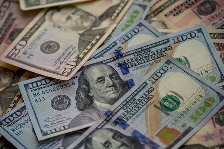 dollars background. Dollars background. Background of different us dollar banknotes. Finance concept.の写真素材
