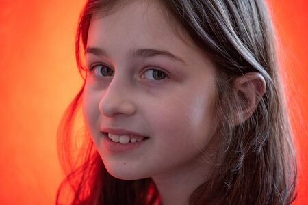 Teenage with a caret. Girl 9 or 10 years old. A cute baby. Serious girl 9 years old. Generation Z.