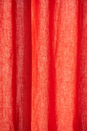 red paint background. Red fabric background. red fabric texture closeup, useful for background. red silk cotton background,fabric cloth textureの写真素材