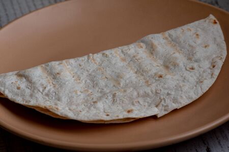 Pita, pitta bread with sausage. Pita with cheese and sausage. Food photographyの写真素材
