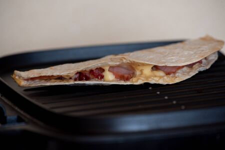 Pita, pitta bread with sausage. Pita with cheese and sausage. Food photographyの写真素材