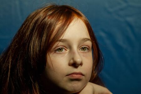 portrait of a little girl. Girl 9 years old. Representatives of the Alpha generation are much less affected by formal rules. It is important for them not to be in the system, but in the stream.の写真素材