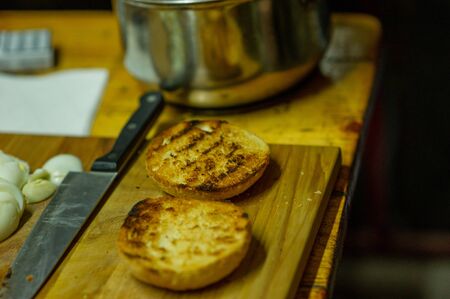 Burger cooking. Cooking grilled burgers at home. Food photographyの写真素材
