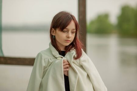 portrait of a little girl. Girl 9 years old. Representatives of the Alpha generation are much less affected by formal rules. It is important for them not to be in the system, but in the stream.の写真素材